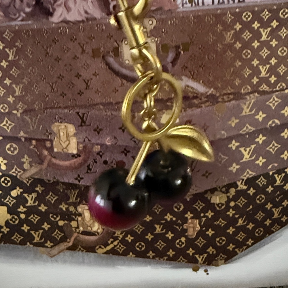 2 tone black  and Purple Cherry Keychain. Gold tone hardware - Picture 3 of 4
